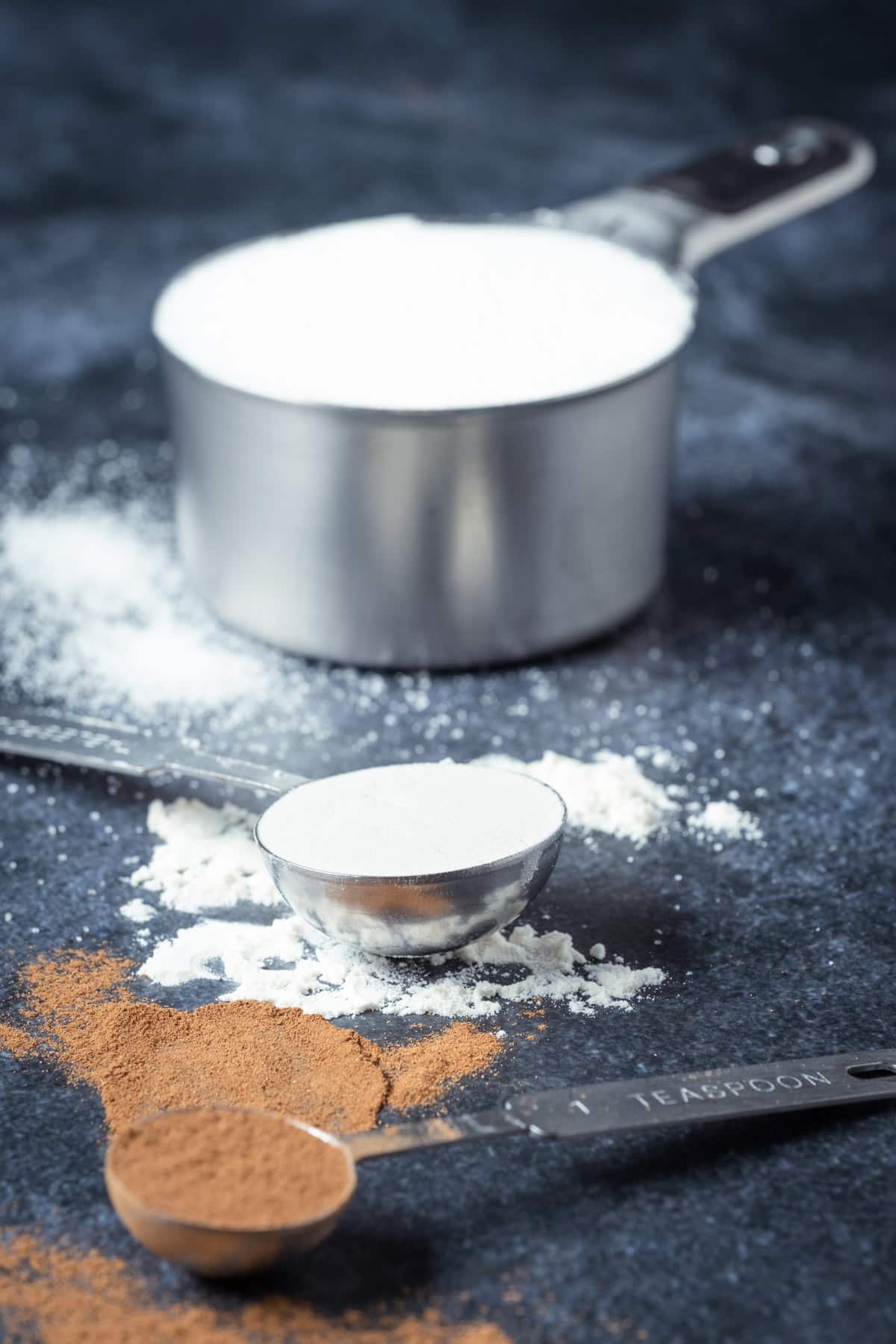 Flour, cinnamon, sugar etc in cups, tablespoons and teaspoons.