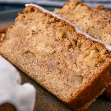 Vegan apple bread slices on a gray plate