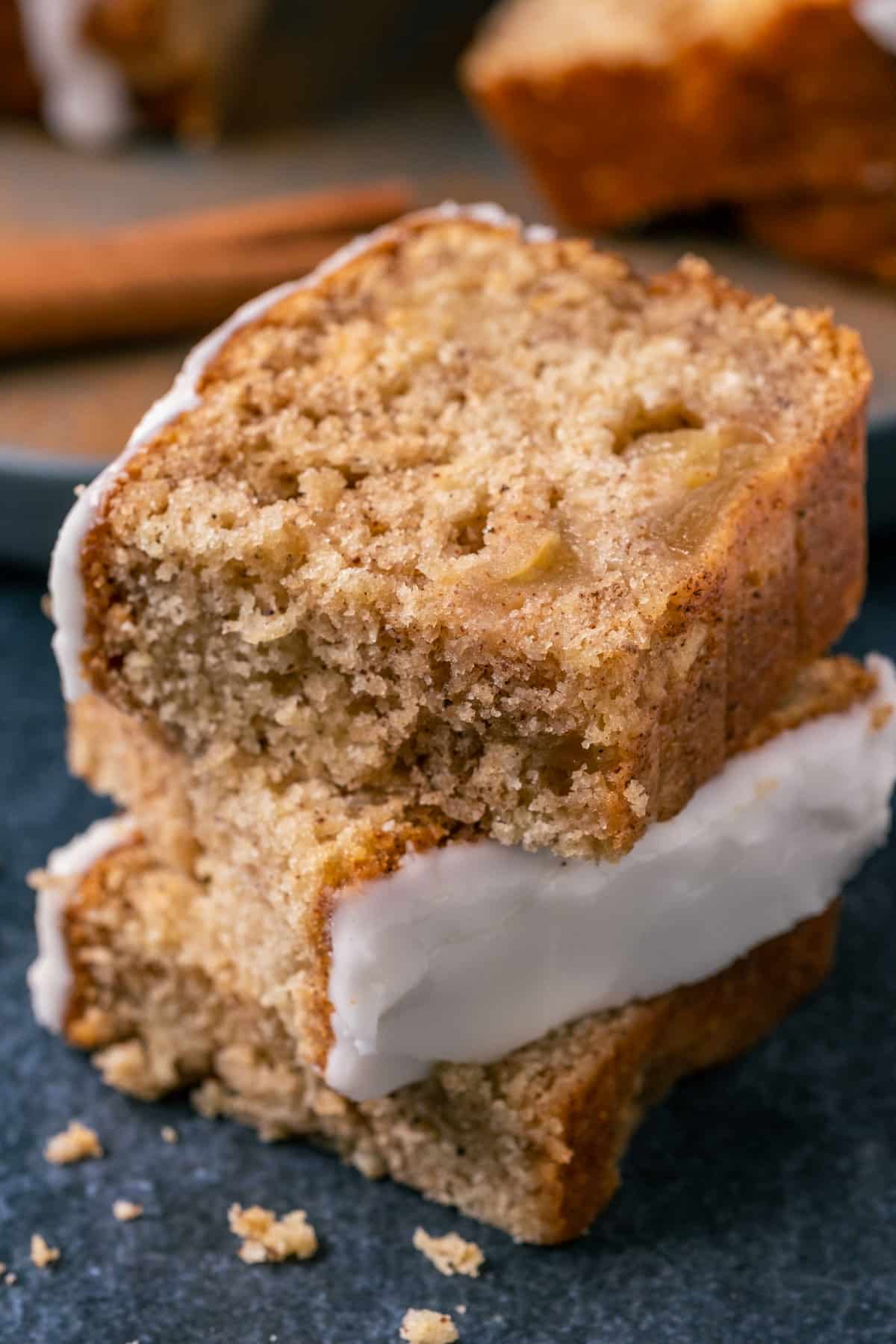 vegan apple bread stacked on a gray plate