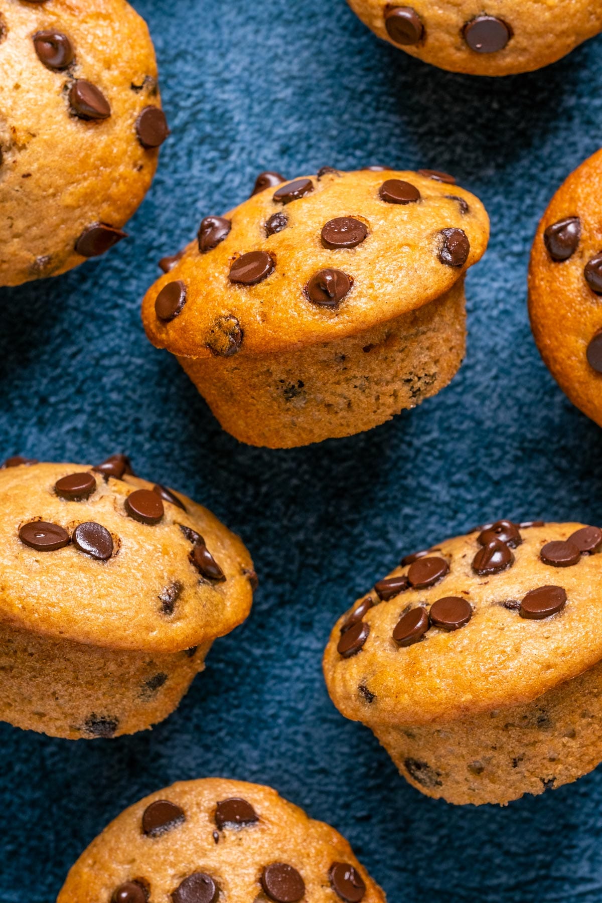 Vegan banana chocolate chip muffins turned on their side.