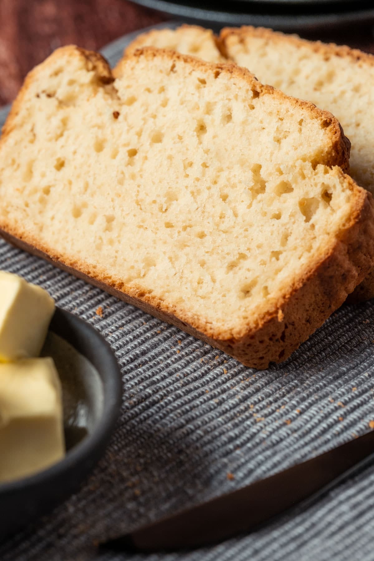 Sliced vegan beer bread on a napkin.