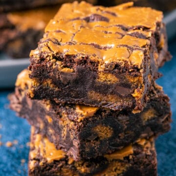 Stack of vegan biscoff brownies.