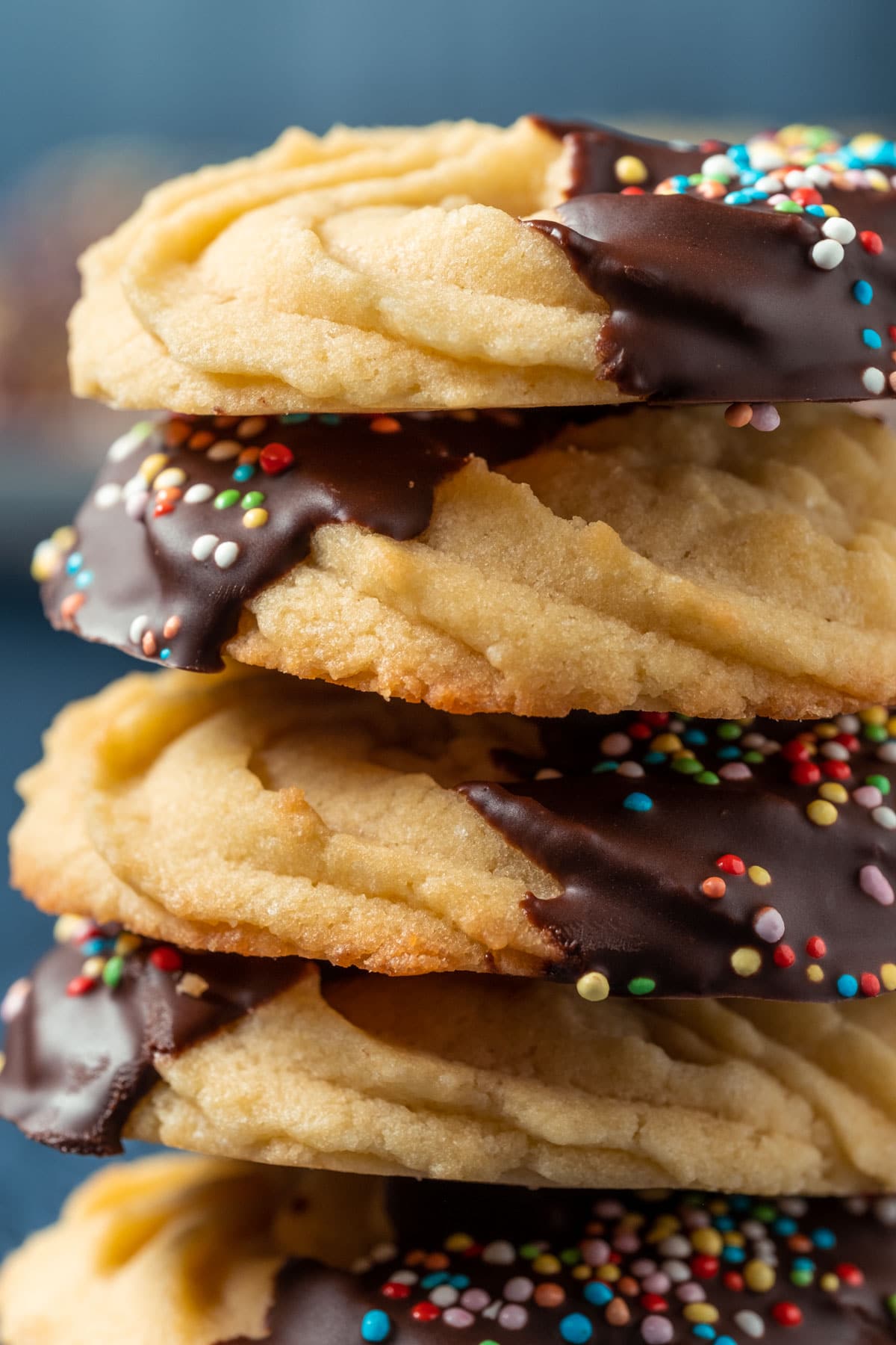 Vegan butter cookies in a stack of five.