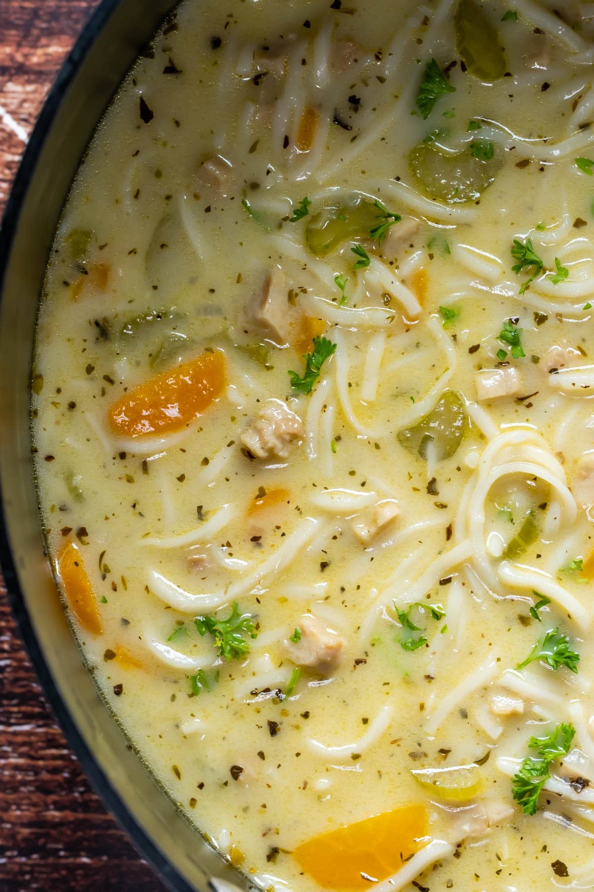 Vegan chicken noodle soup in a pot.