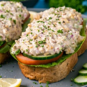 Vegan chicken salad on open faced sandwiches.