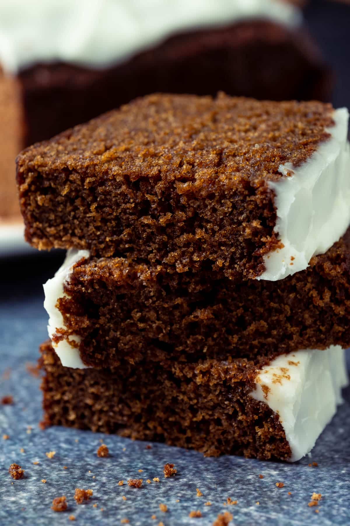 Slices of gingerbread cut in half and stacked.