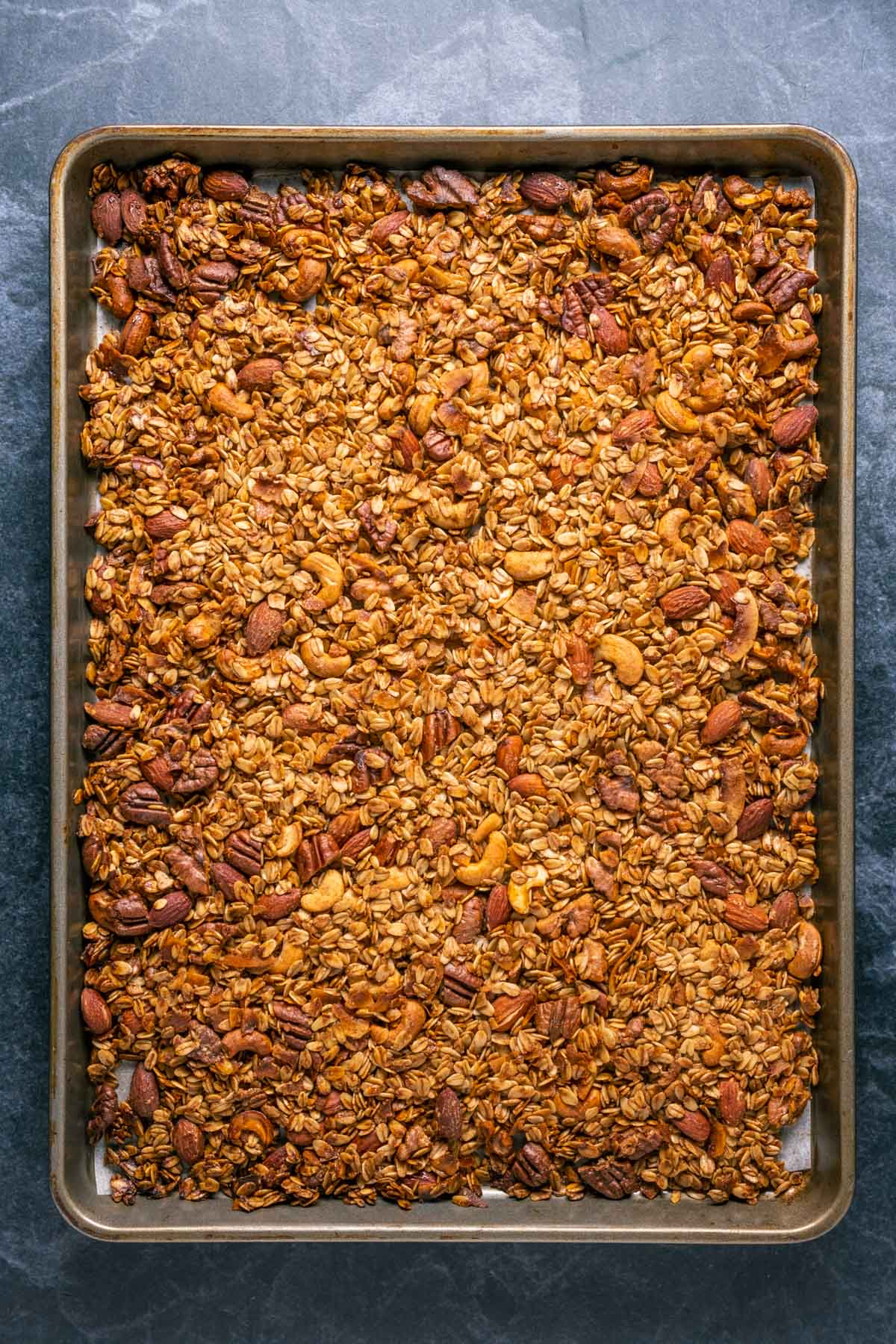 Granola on a baking sheet.