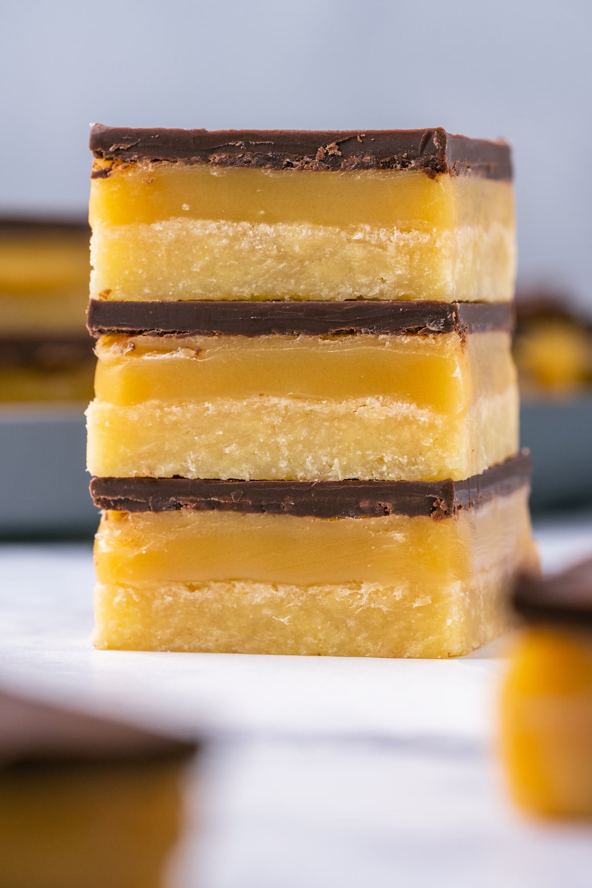 Vegan millionaire shortbread in a stack.