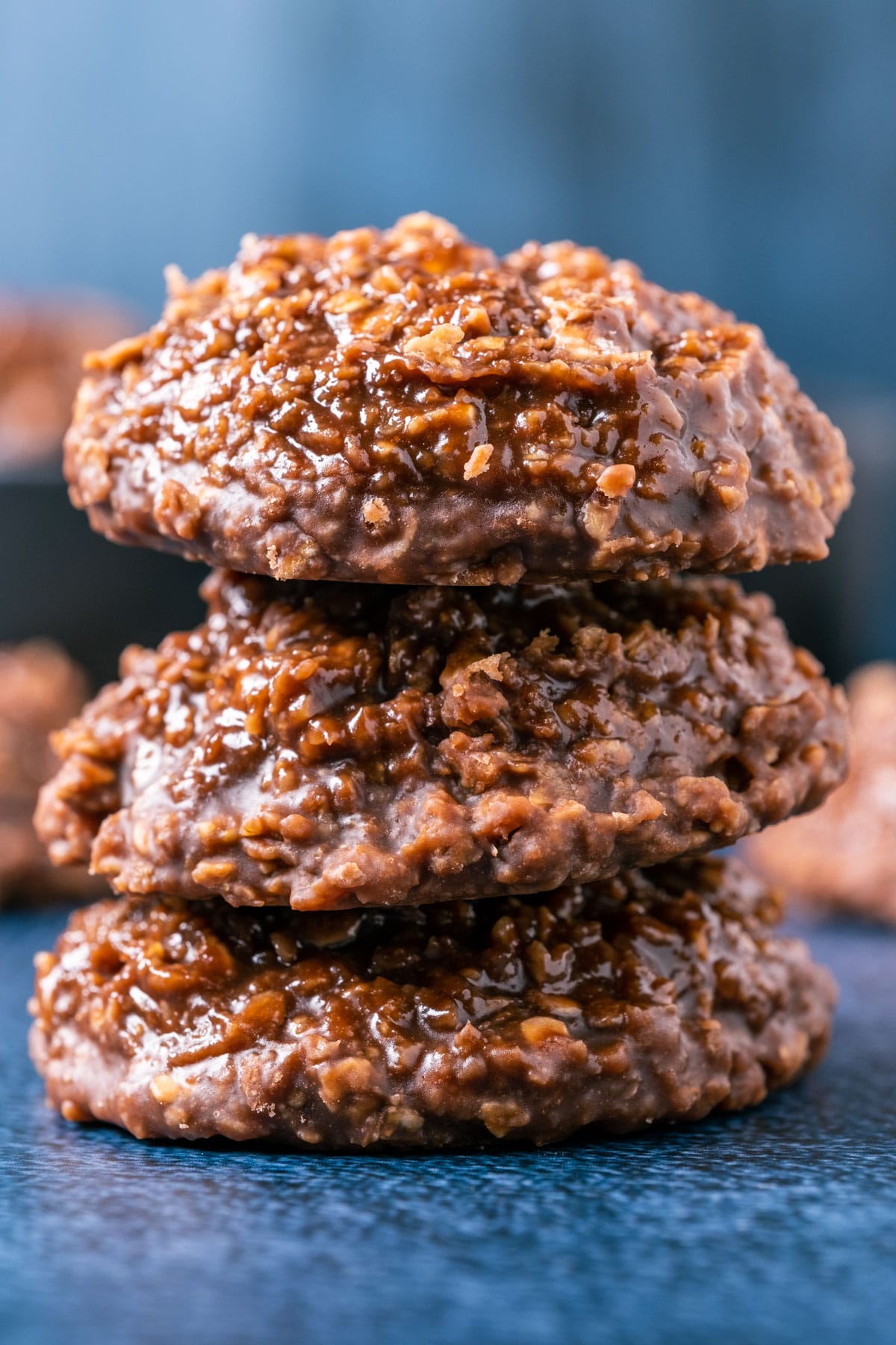 Stack of three vegan no bake cookies.