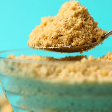 Spoonful of vegan parmesan cheese.