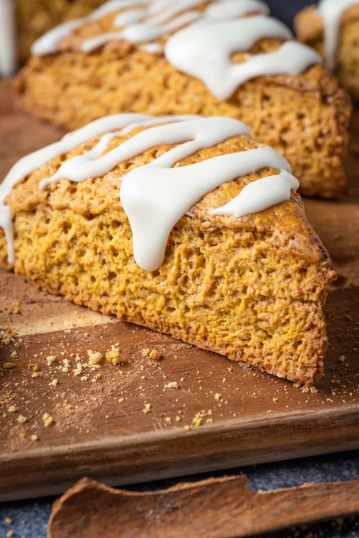 Pumpkin scones on a wooden board.