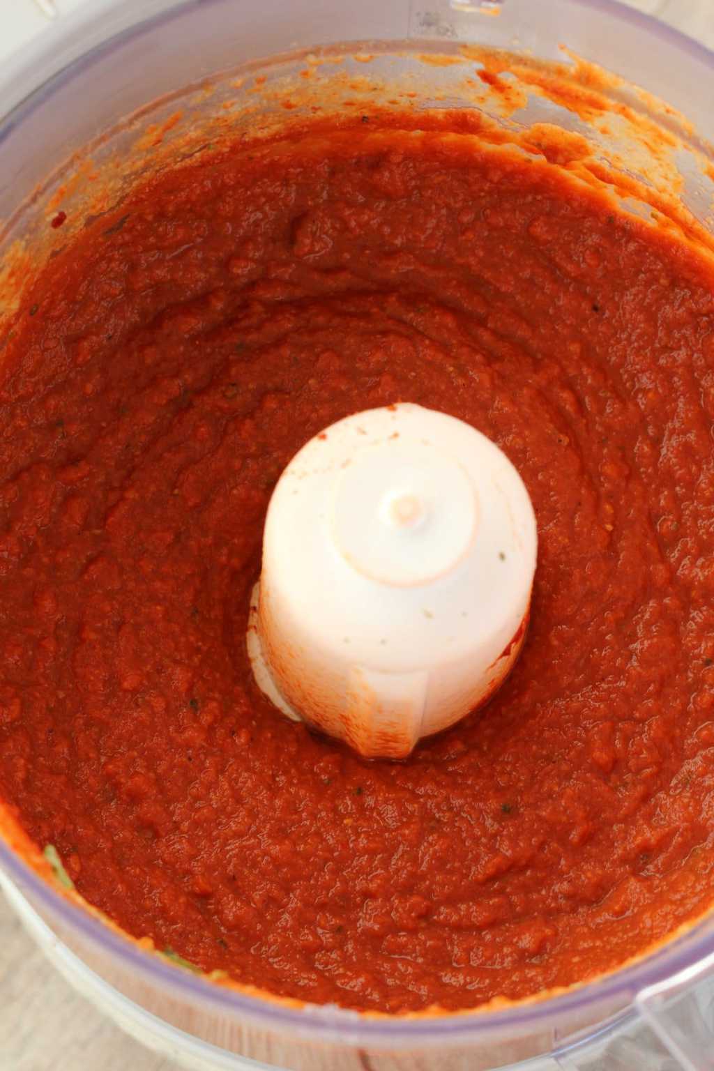 Ingredients to make a vegan steak blended up in a food processor. 