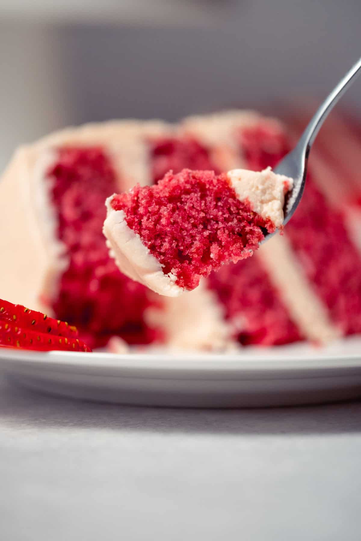 Forkful of strawberry cake.