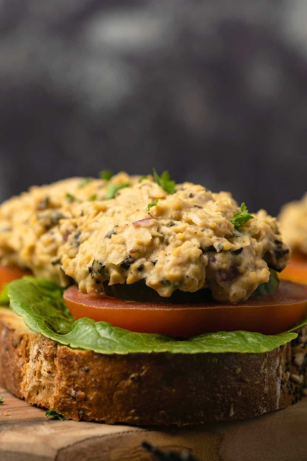 Vegan tuna on bread with tomato and lettuce. 