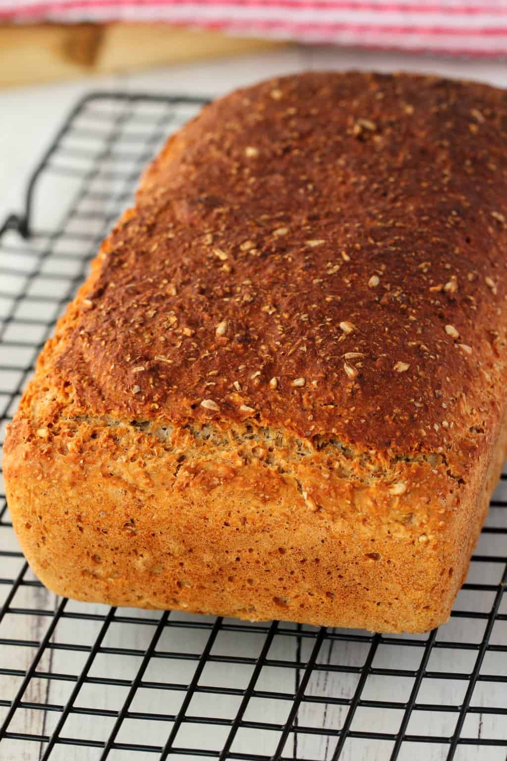 Wholewheat Bread on a wire cooling rack. 